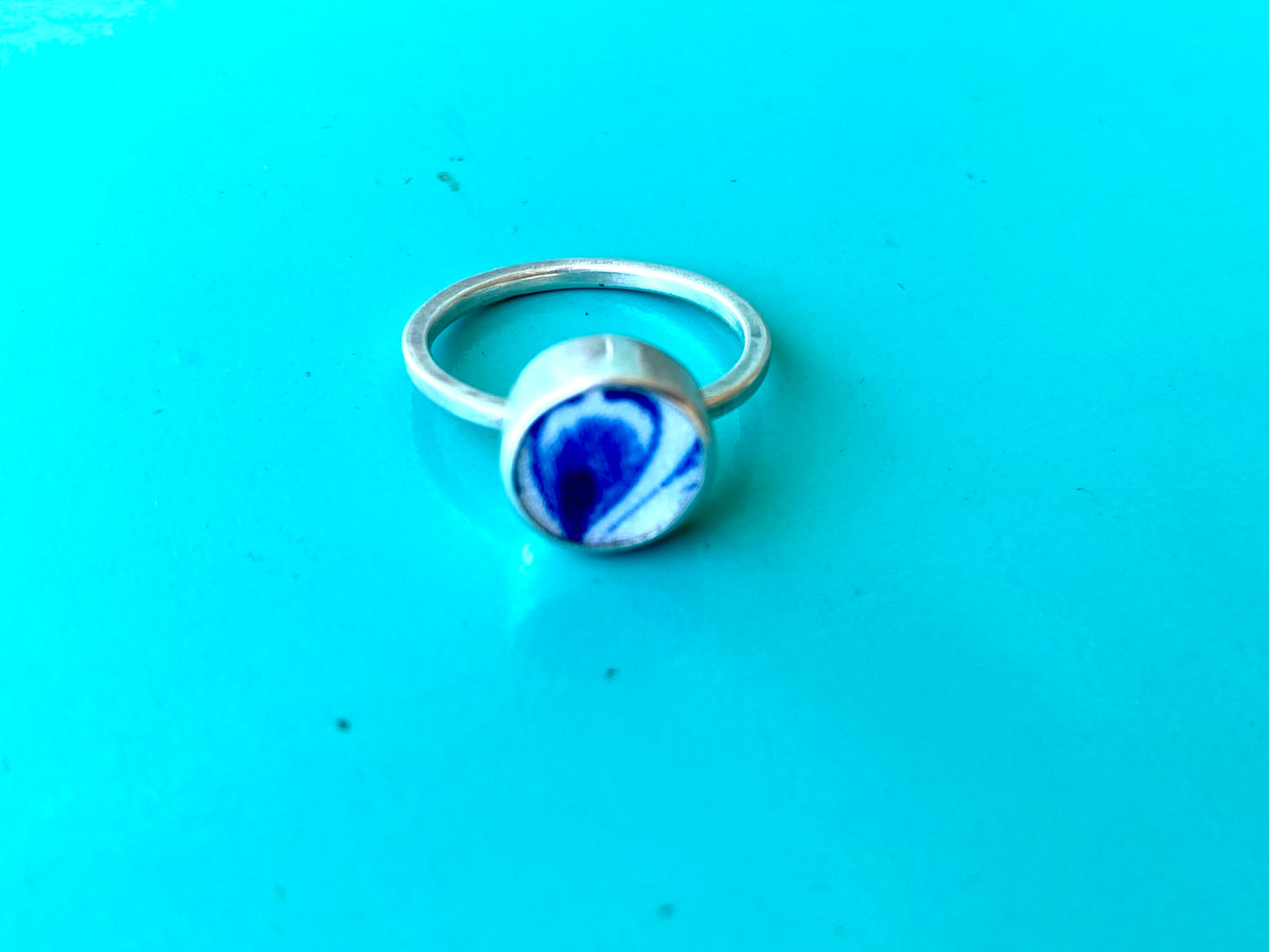 Peacock blue & white ring