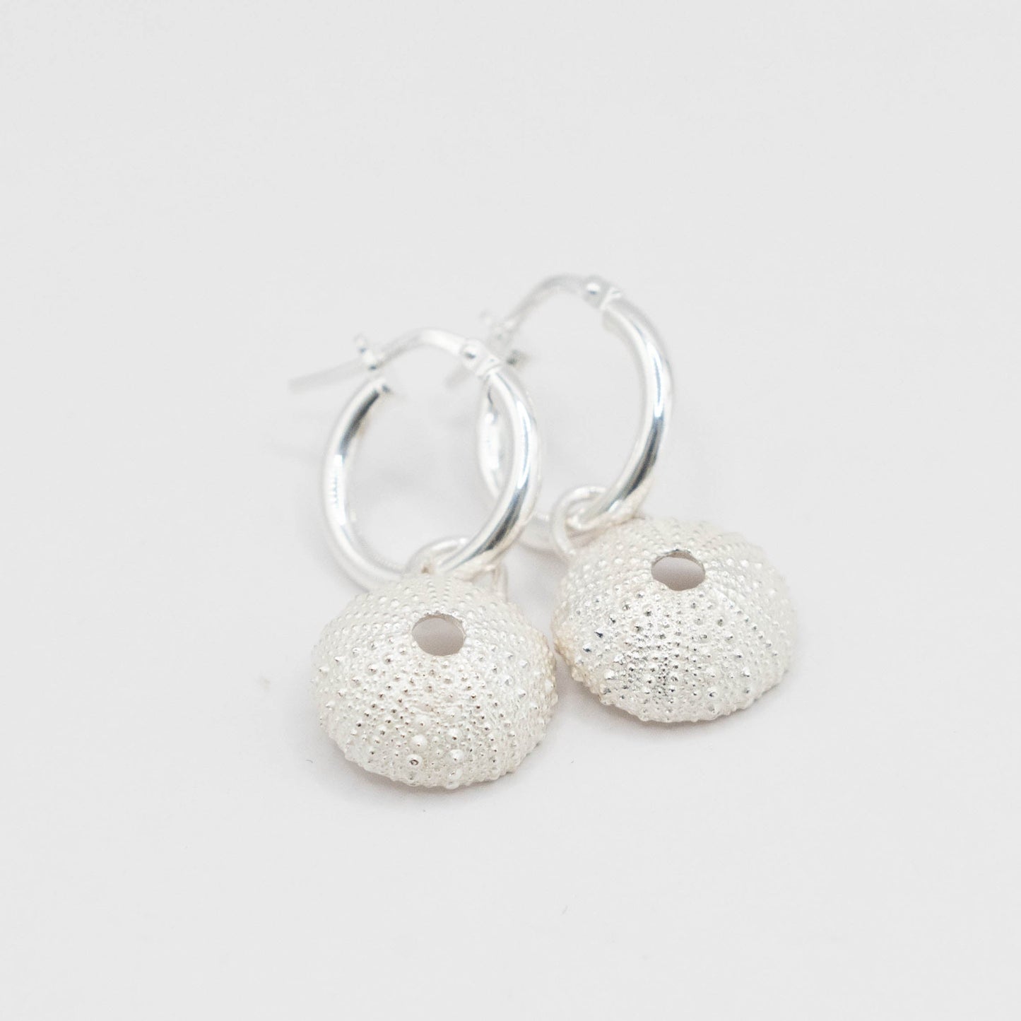 Sterling Silver Sea Urchin Charm Earrings - close up showing bumpy organic texture on hoop fitting