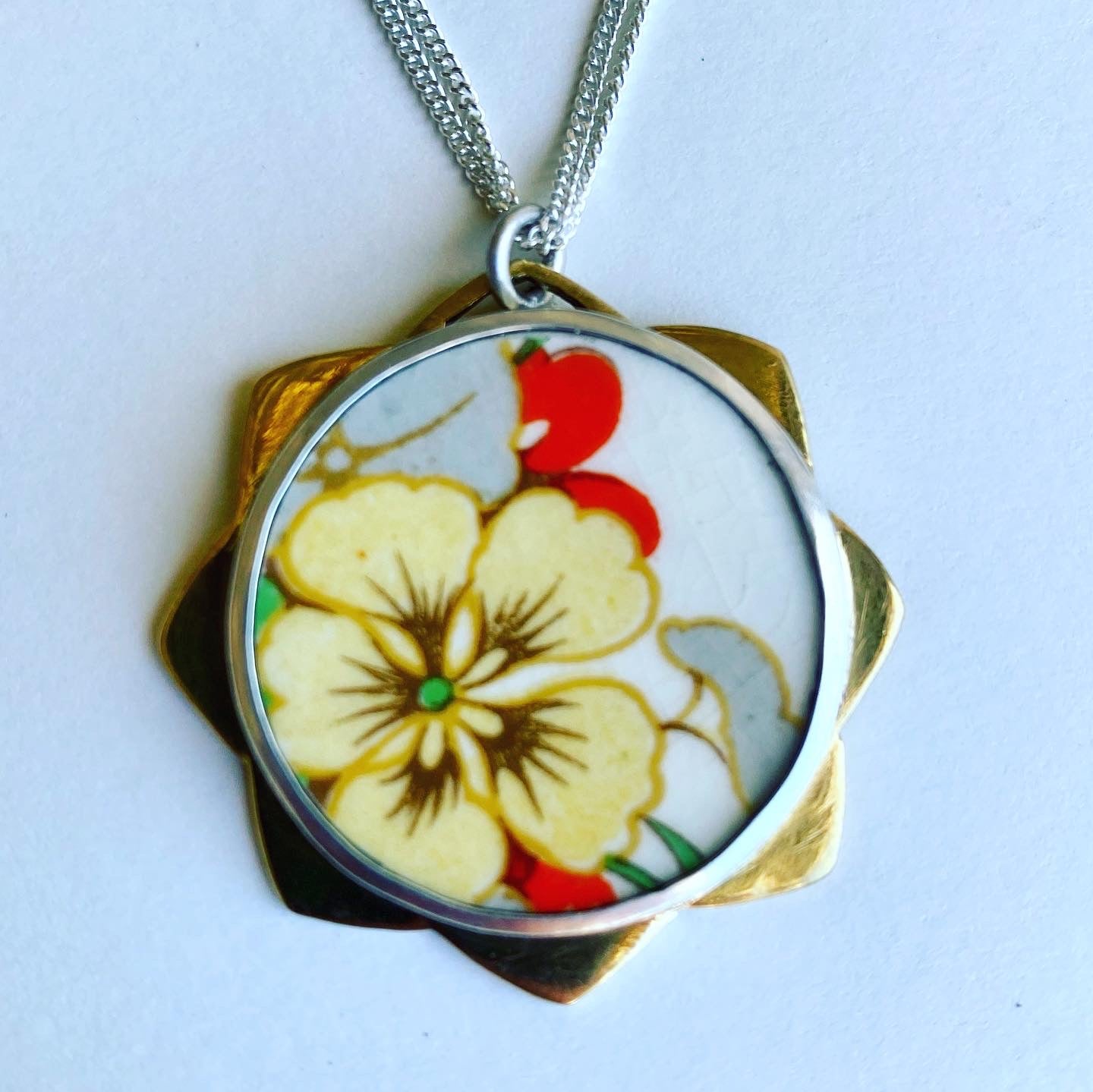 Yellow nasturtium flower ceramic pendant