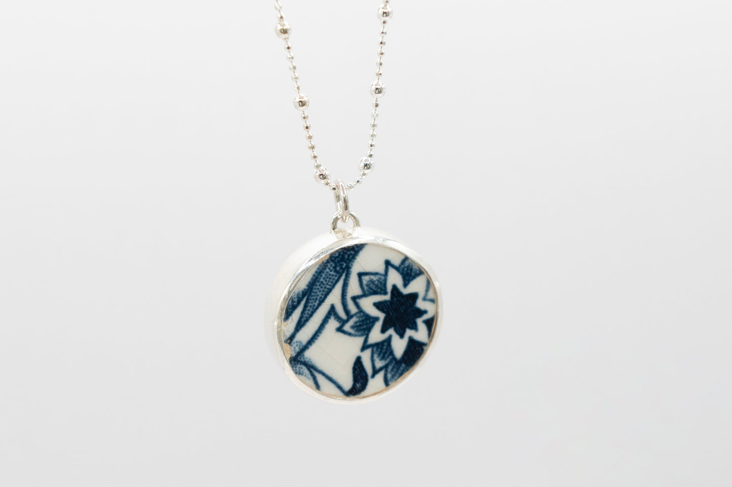 Blue & White ceramic pendant, set in sterling silver