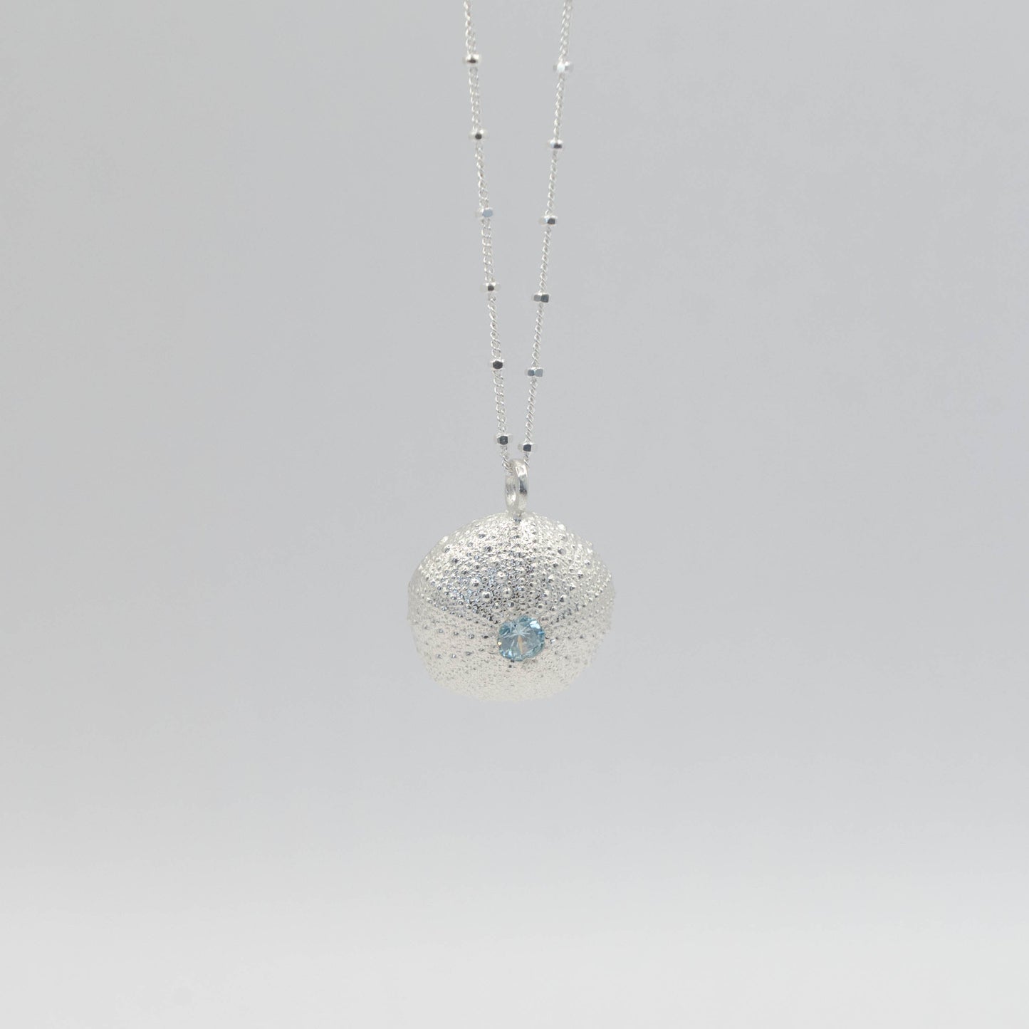 Large Silver sea urchin with a gem stone setting
