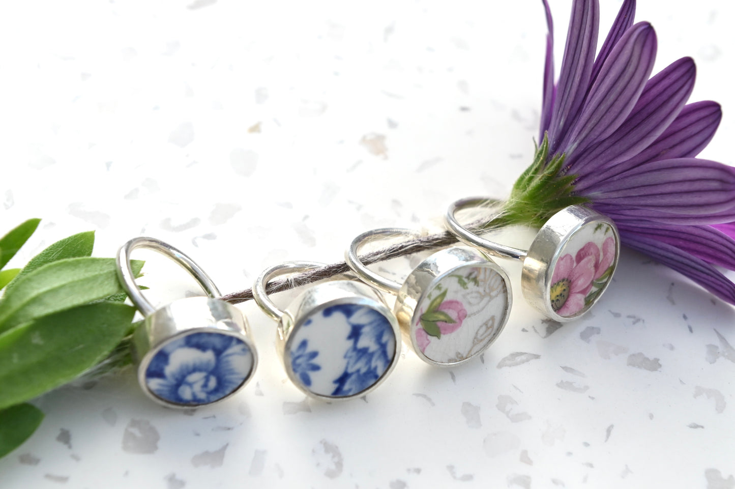 Pink and green floral ceramic set in silver ring