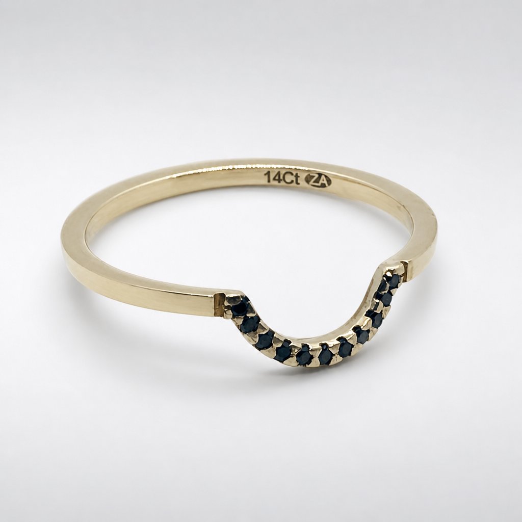 Custom 14ct gold curved wedding band with black diamond pavé setting - Natasha Wood Jewellery