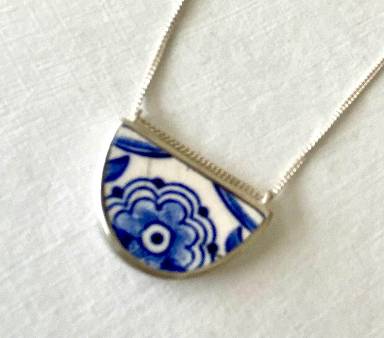 Blue and white half round pendant
