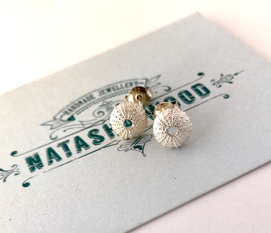 Sterling silver sea urchin stud earrings displayed on a branded Natasha Wood Jewellery card.
