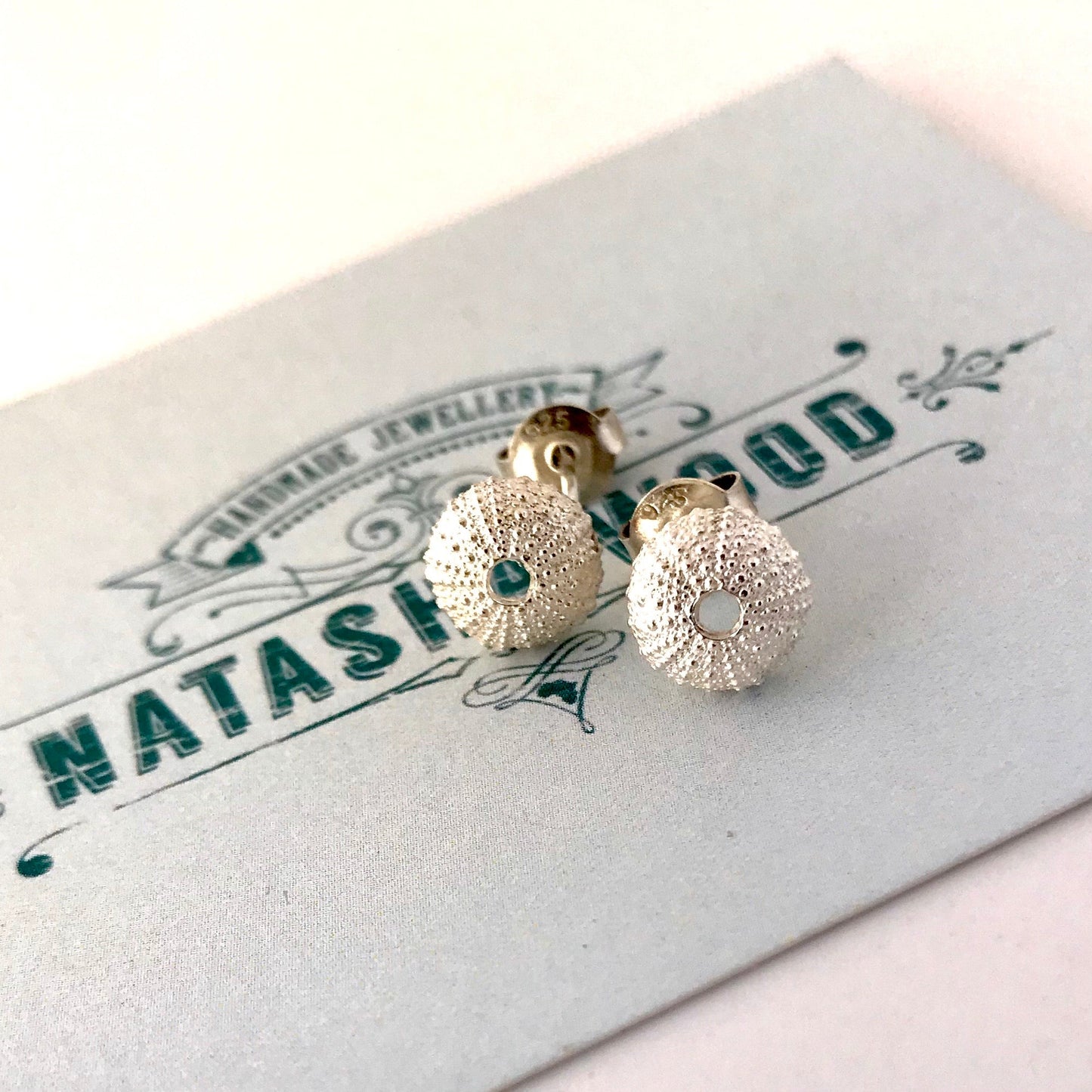 Sea Urchin Stud Earrings - front view sterling silver, textured dome surface