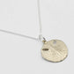 Small Pansy Shell Pendant - angled chain view, solid brass on sterling silver curb chain