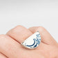 Half round ring with blue and white antique ceramic set in silver