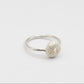 Sea Urchin Ring - sterling silver, angled three-quarter view showing band and shell texture