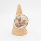Autumn Leaf Antique Ceramic Ring - front view on wooden ring cone, handmade sterling silver