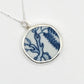 Willow Love Story Pendant - front angled view, antique blue Willow Pattern ceramic set in sterling silver bezel with trace chain