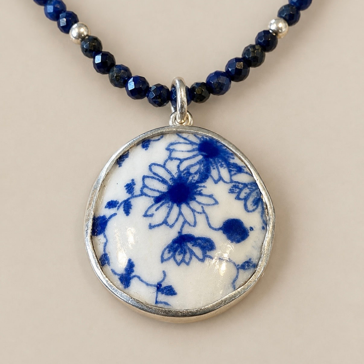 I was once a tea cup, now a pendant