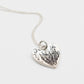 Protea Heart Pendant – close-up oxidised protea etching – sterling silver