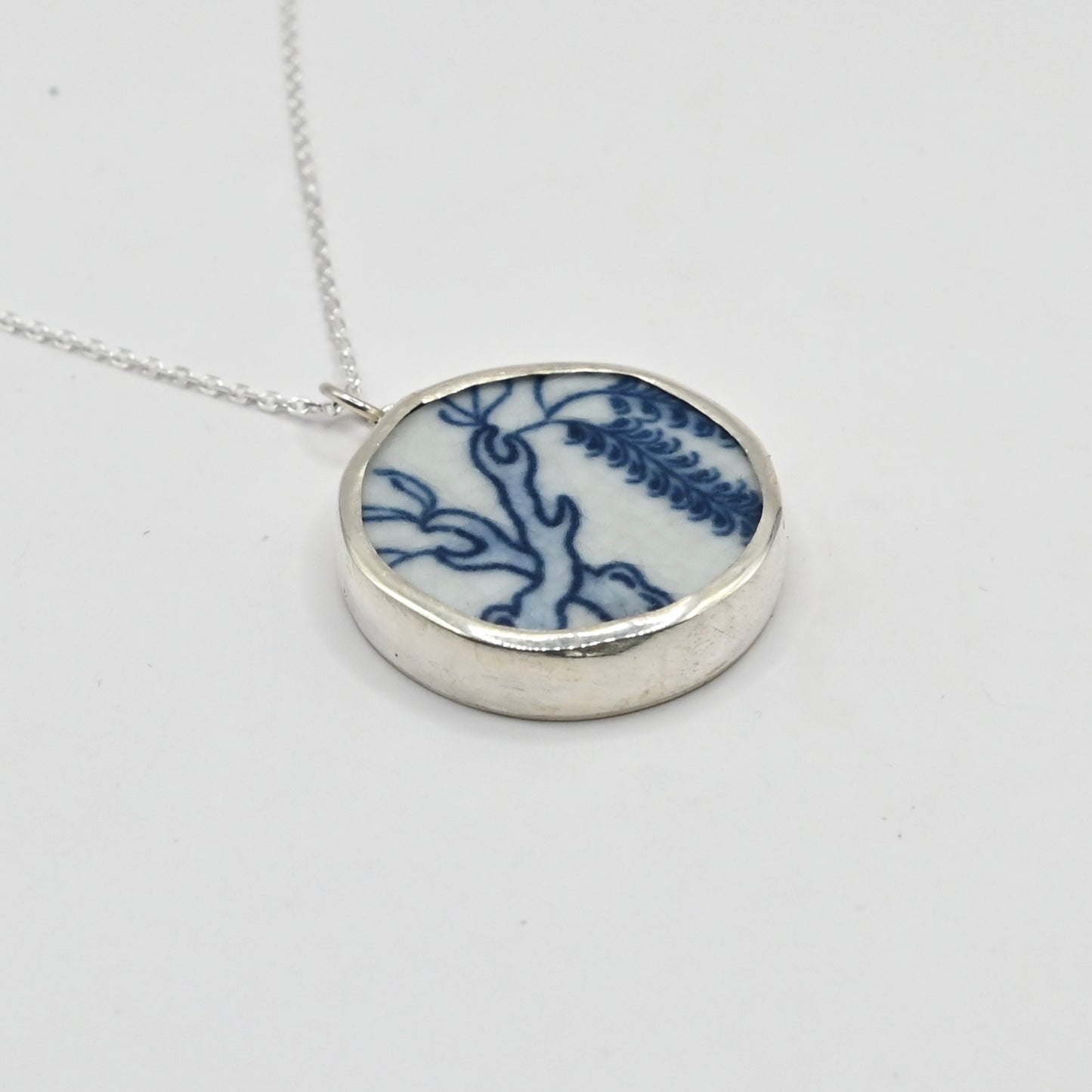 Willow Love Story Pendant - reverse side showing polished sterling silver back with trace chain bail