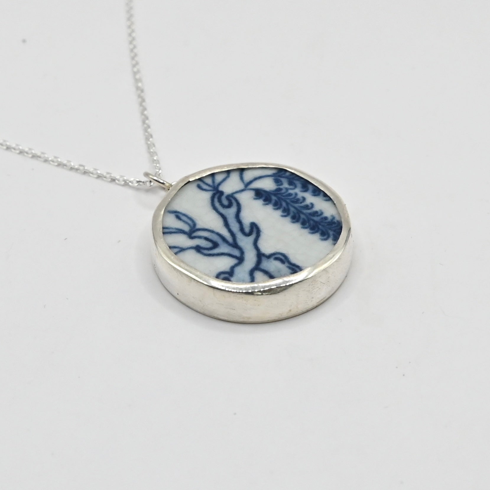 Willow Love Story Pendant - reverse side showing polished sterling silver back with trace chain bail