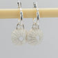 Silver Urchin Charm Hoop Earrings - front view textured sterling silver charms on display rod