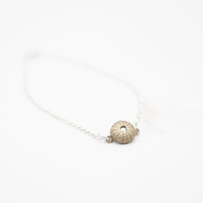 Sterling Silver Sea Urchin Bracelet - close-up of sea urchin charm on white background
