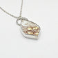 Handcrafted antique ceramic shard pendant in sterling silver - close up detail of floral motif and bezel setting