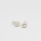 Sea Urchin Stud Earrings - top-down view sterling silver showing central hole and spine pattern