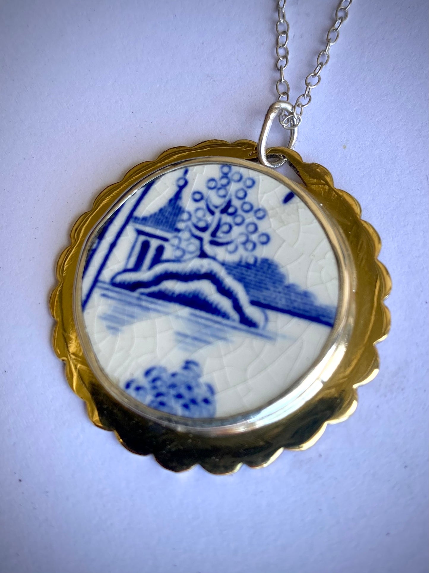 Blue and white Porcelain, silver and brass pendant