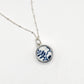 Handcrafted Double Shard Necklace - side angle green floral antique ceramic shard in deep sterling silver cylinder bezel pendant