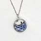 Reversible antique china shard necklace - front face Blue Willow pattern set in sterling silver bezel with satellite chain