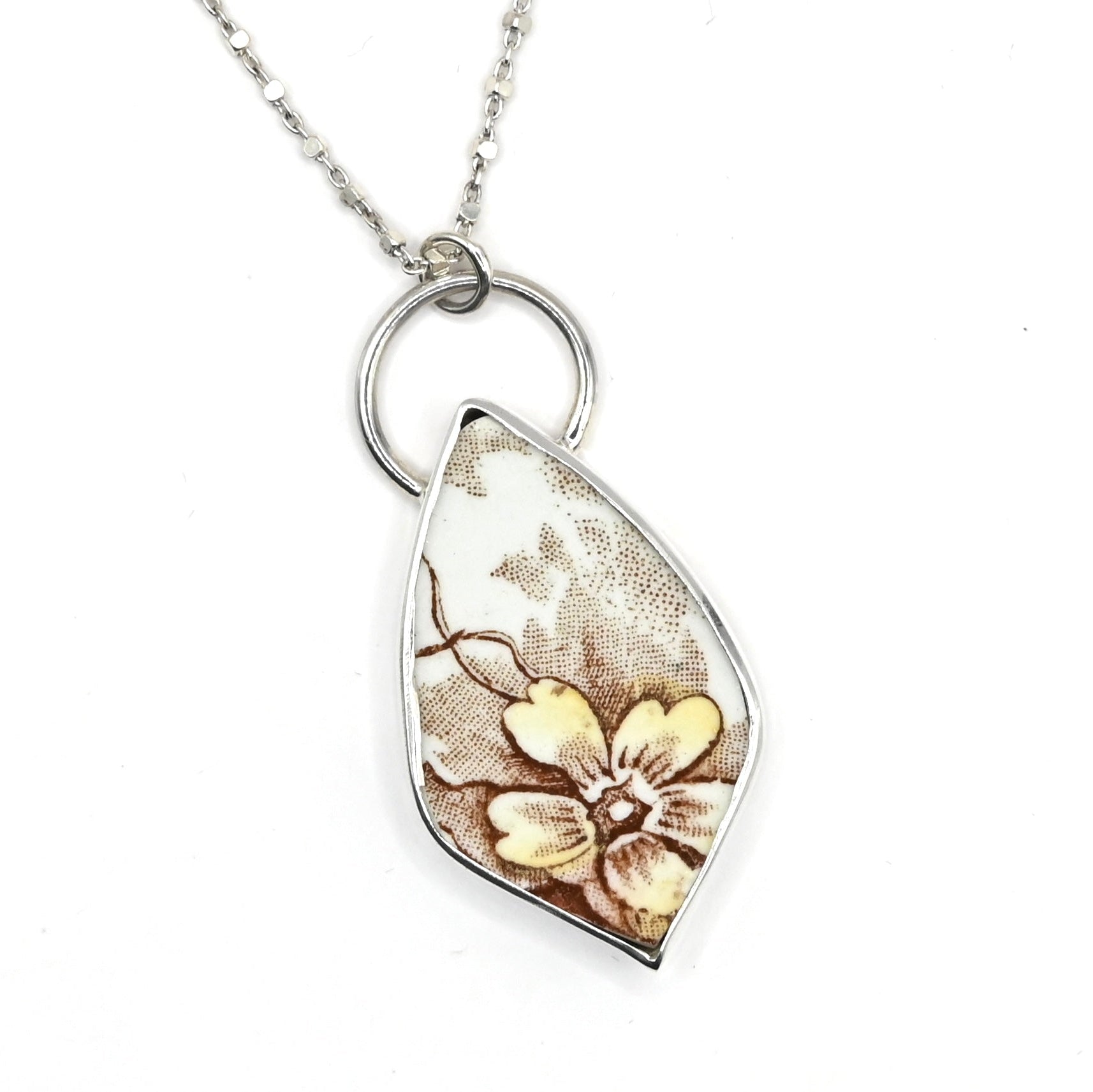 Antique ceramic shard sterling silver pendant - front view floral motif handcrafted by Natasha Wood
