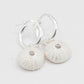 Silver Sea Urchin Hoop Earrings - overhead flat lay white background sterling silver