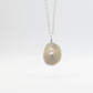 Santa Maria Limpet Shell Pendant - front hanging view, sterling silver finish on chain