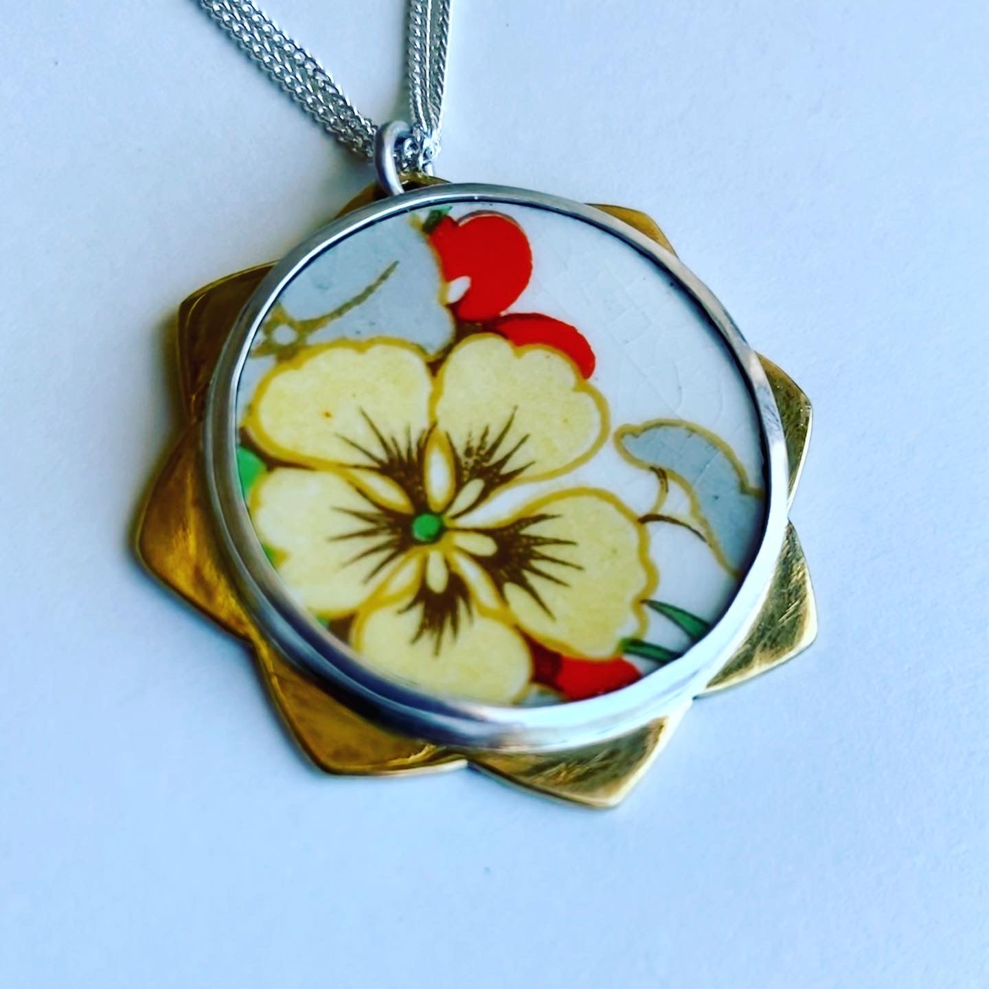 Yellow nasturtium flower ceramic pendant