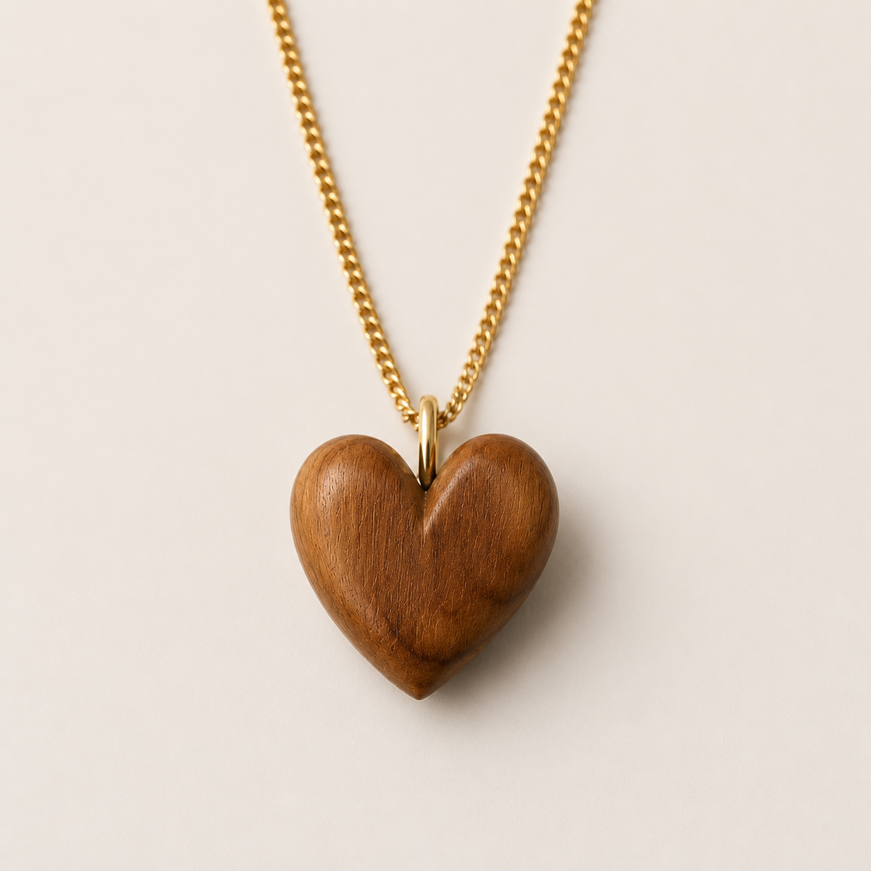 Hand carved olive wood heart pendant
