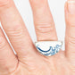 Half round ring with blue and white antique ceramic set in silver
