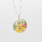 Antique Ceramic floral design and silver pendant
