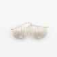 Medium Urchin Hook Earrings in sterling silver - flat lay on white, showing soldered silver hook detail