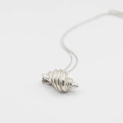 Tulip Conch Necklace - close-up angle sterling silver pendant on white background
