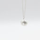Small Sea Urchin Pendant - sterling silver side angle showing dome texture, white background