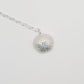Large Silver sea urchin with a gem stone setting