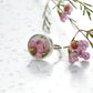 Pink bloom from broken China set in silver