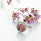 Pink bloom from broken China set in silver