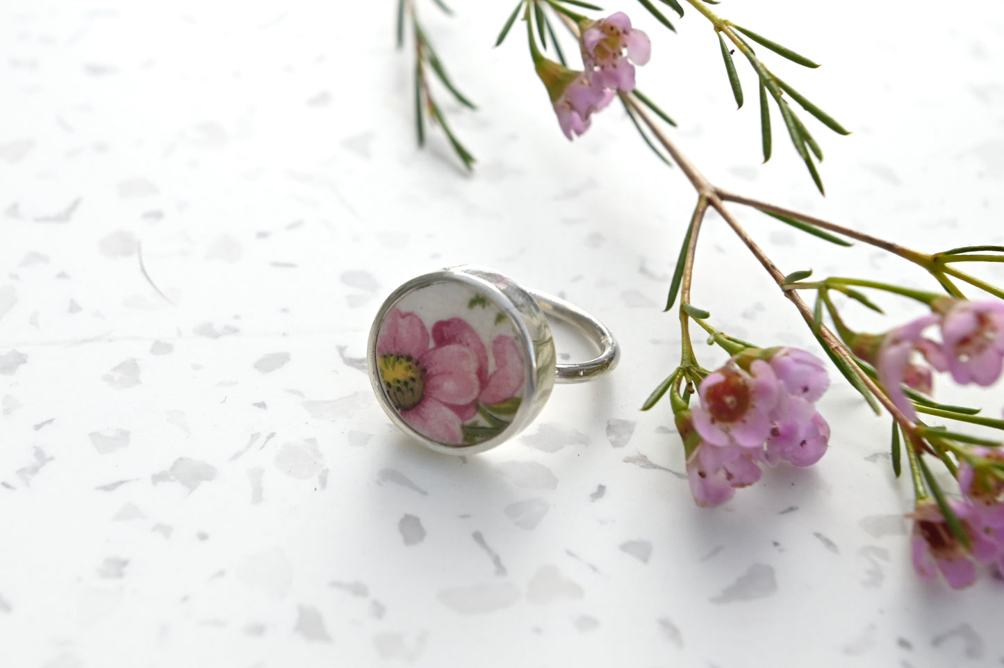 Pink bloom from broken China set in silver