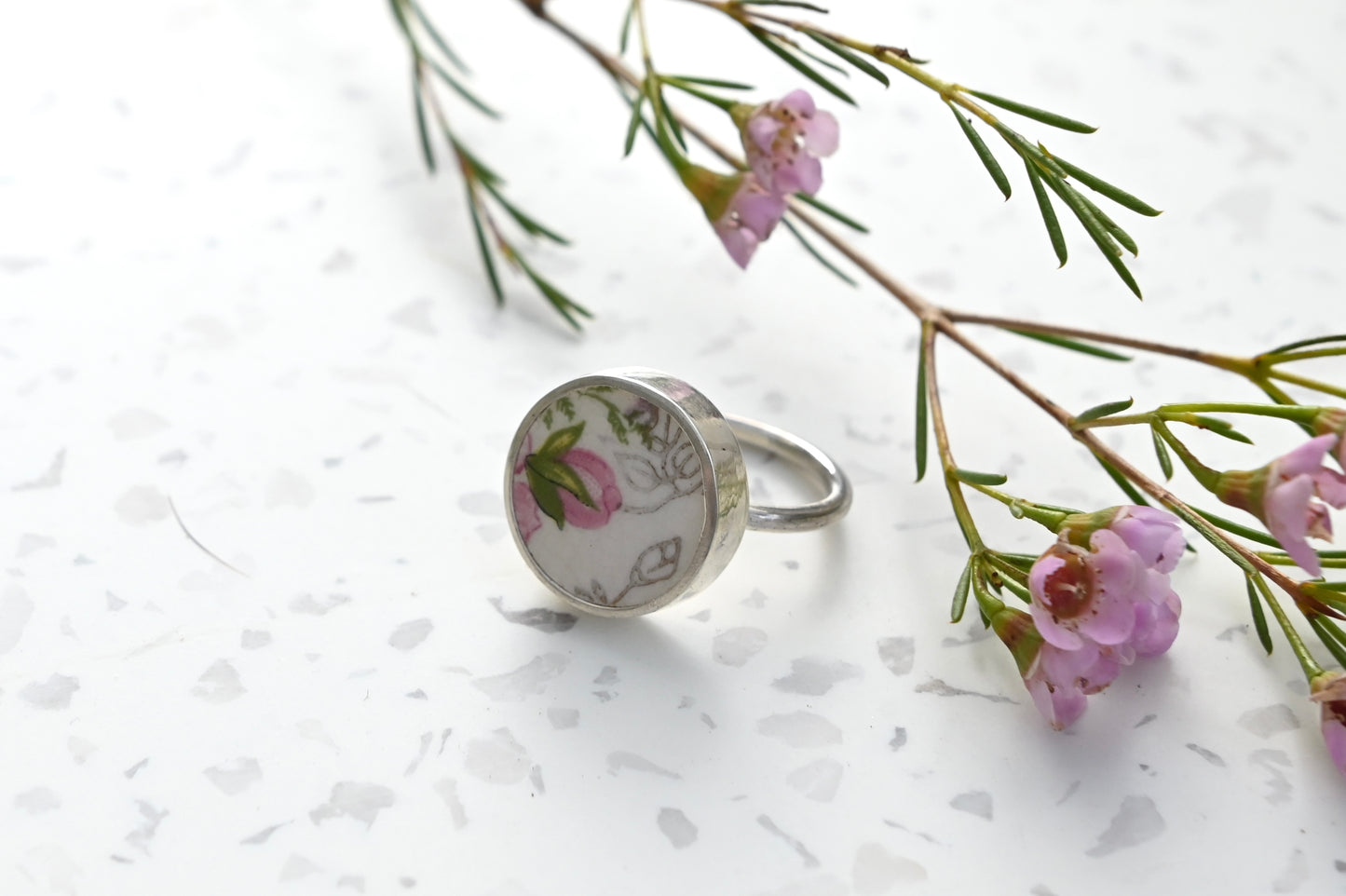 Pink and green floral ceramic set in silver ring