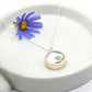 Double sided pendant made with broken china and sterling silver