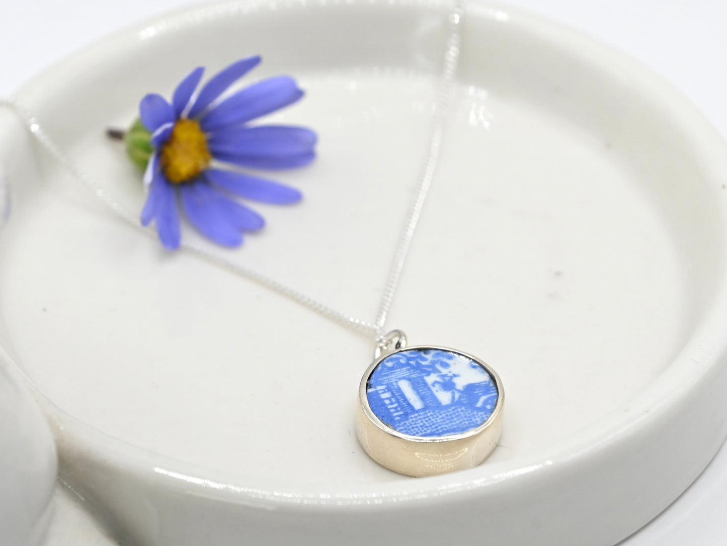 Double sided pendant made with broken china and sterling silver