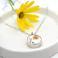 Double sided pendant with broken china