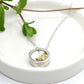 Double sided pendant with broken china