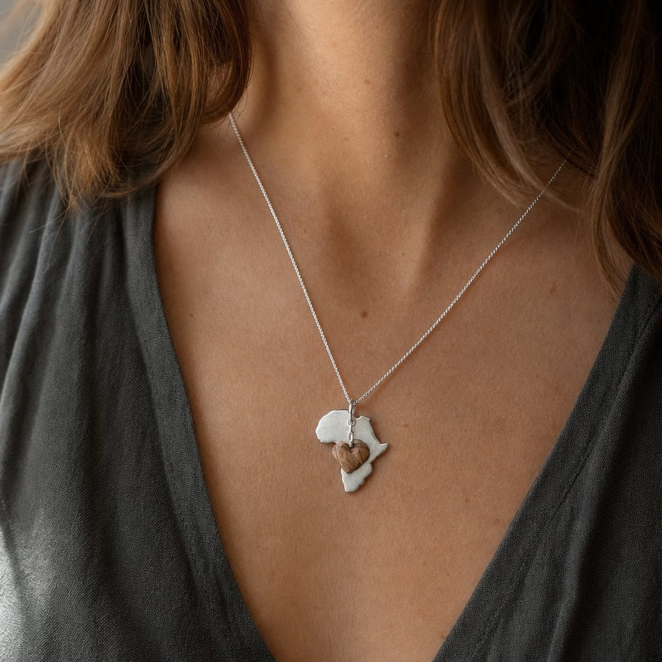 Africa Silhouette Pendant - front view sterling silver with hand-carved olive wood heart charm