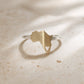 Africa Silhouette Ring by Natasha Wood Jewellery - brass and silver with heart cutout detail, front view