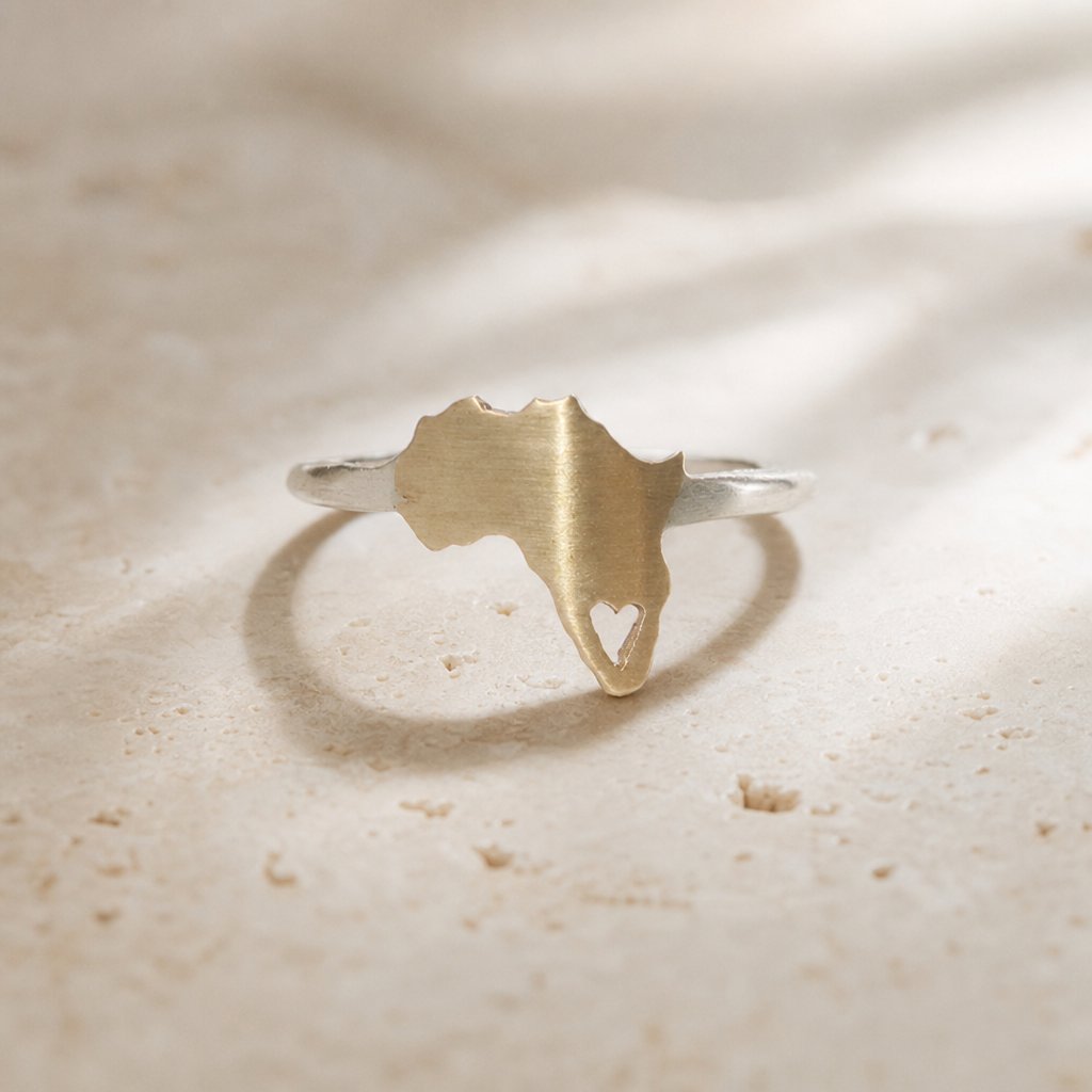 Africa Silhouette Ring by Natasha Wood Jewellery - brass and silver with heart cutout detail, front view