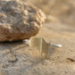Africa Silhouette Ring by Natasha Wood Jewellery - brass and silver with heart cutout detail, front view