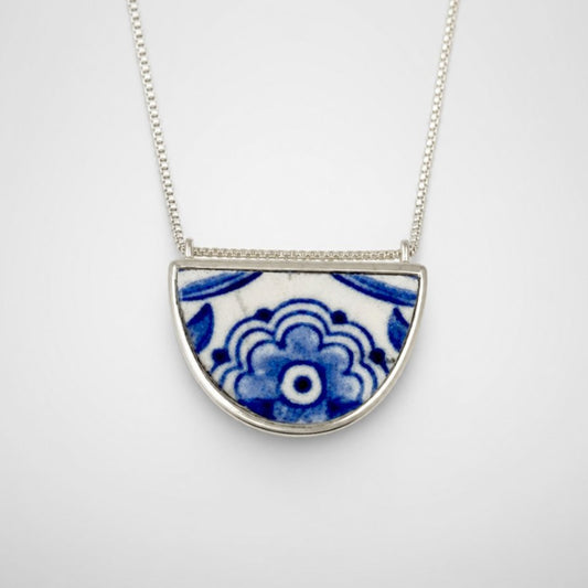 Blue and White Delft Ceramic Half-Round Pendant - front view, antique transferware set in sterling silver